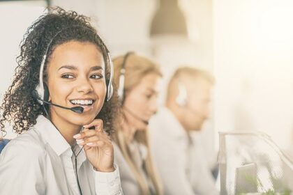 Call center worker accompanied by her team.