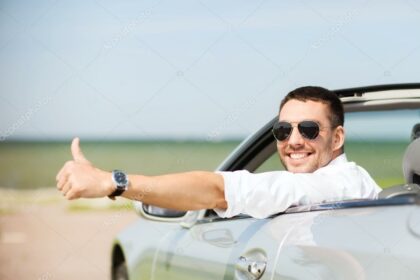 depositphotos_80122380-stock-photo-happy-man-driving-car-and