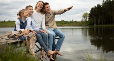full-shot-happy-family-outdoors_23-2148996630